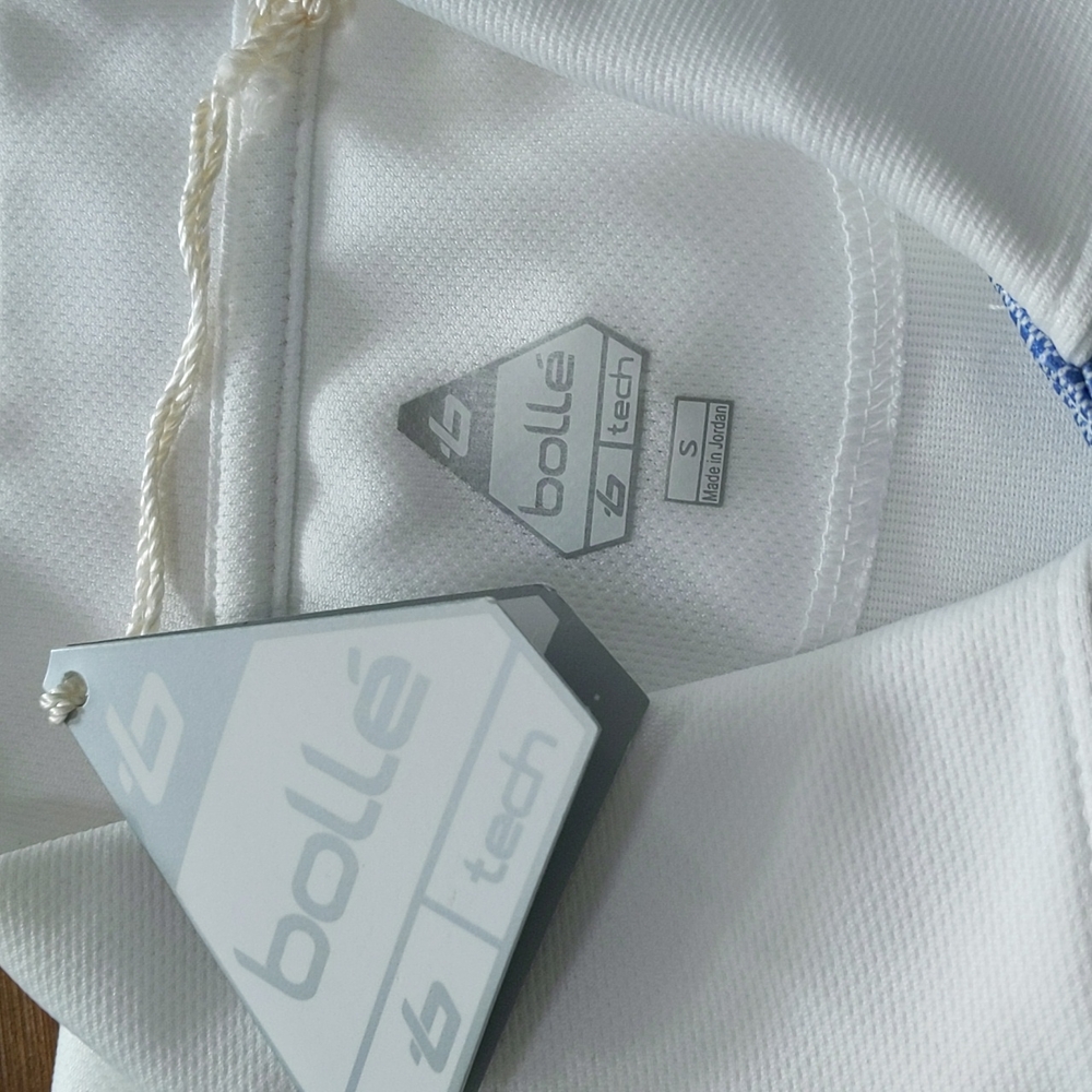 Women's golf/tennis shirt. Size s. bollé. White with blue accents. Quick dry.